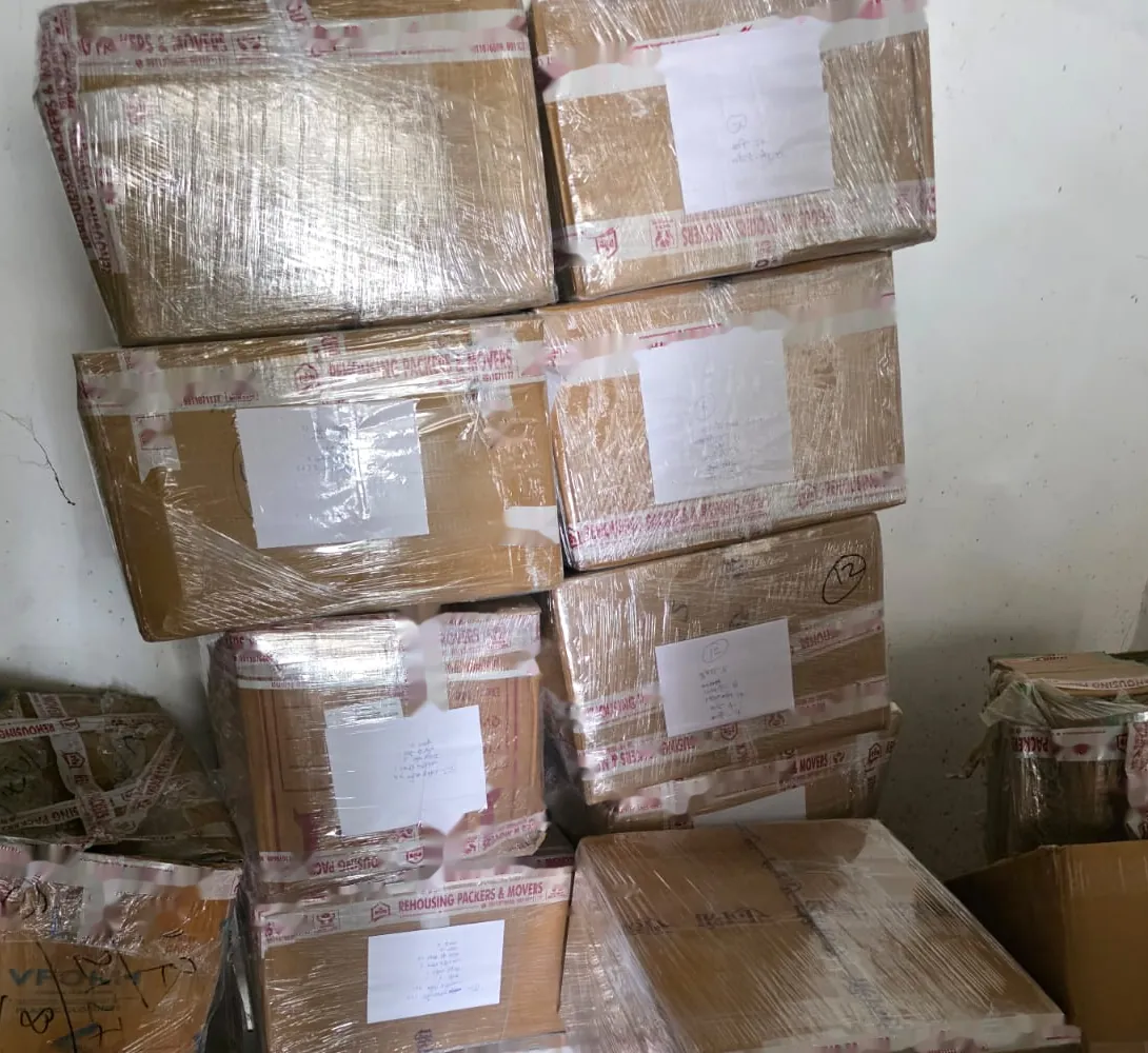 Pallet of numbered household boxes in NCR storage